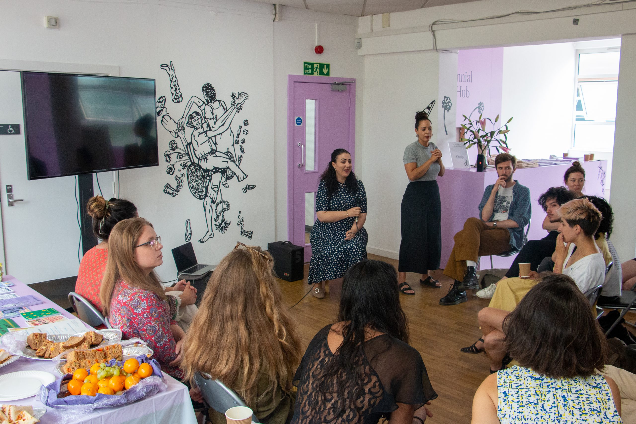 Documentation from event with audience sat in a circle around filmmaker Lynda Ouazar. Image by Kes.
