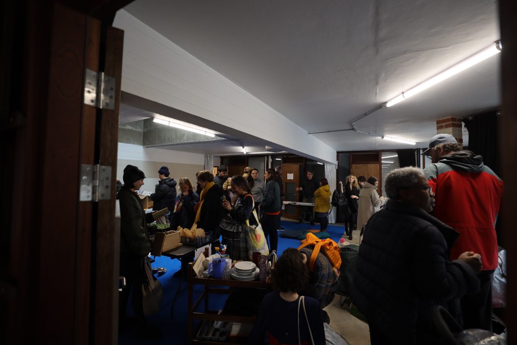 Documentation of event showing visitors to the swap shop
