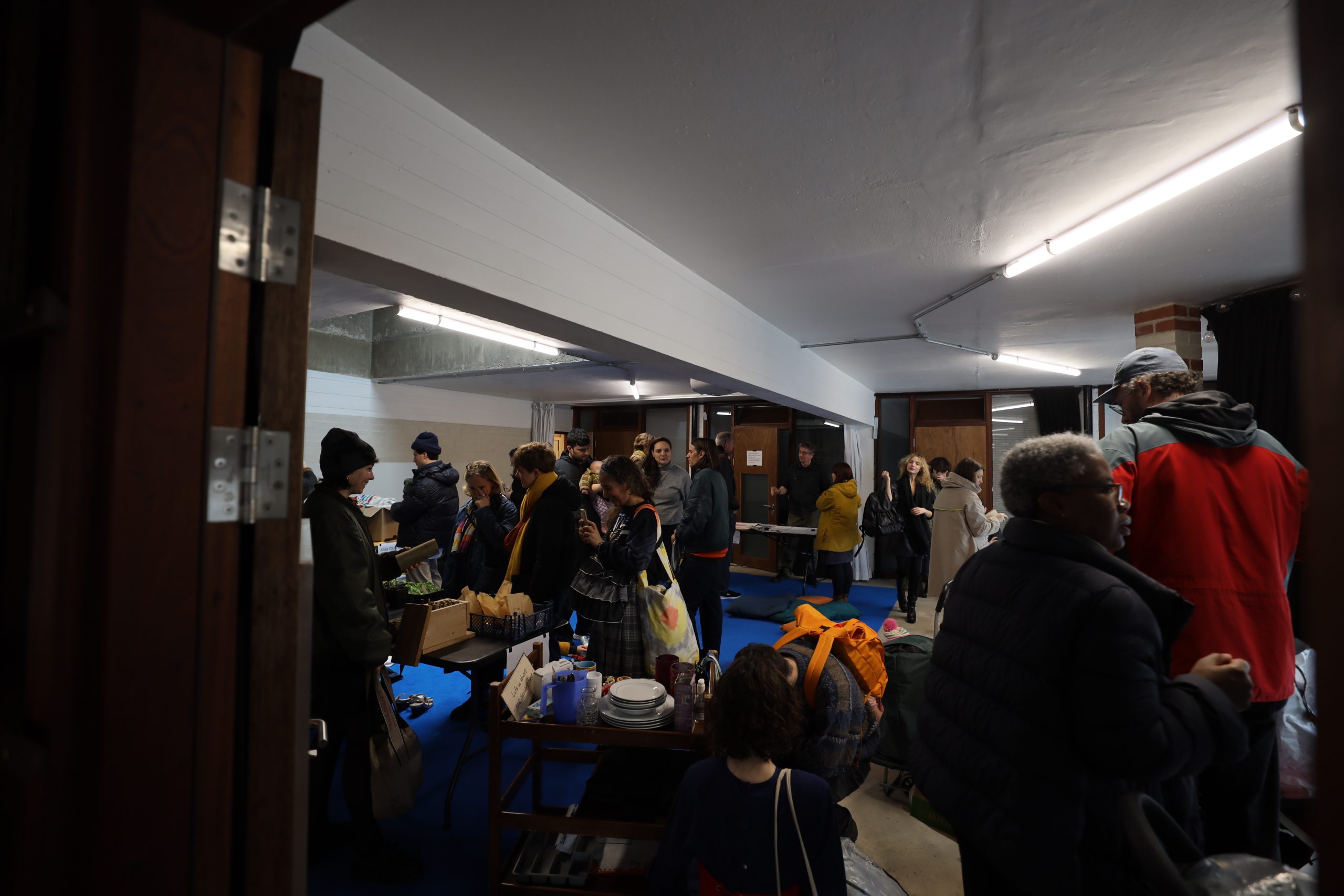 Documentation of event showing visitors to the swap shop 