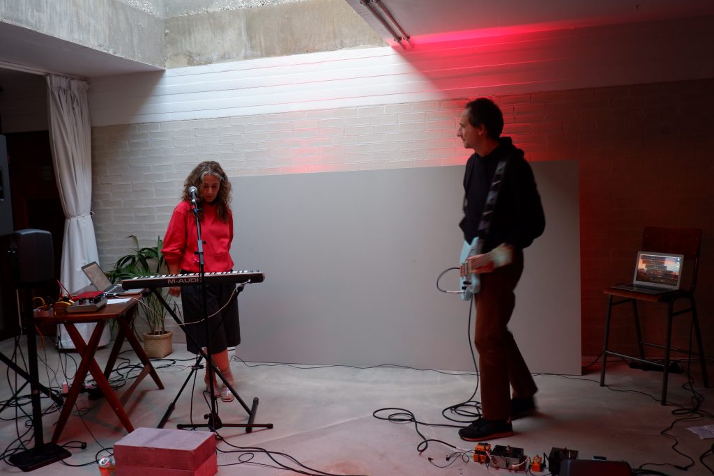 Documentation from gig with Ulijona behind keyboard and James on guitar